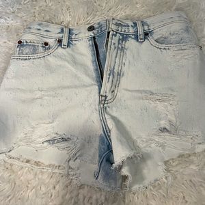 Abercrombie and Fitch light blue ripped shorts.